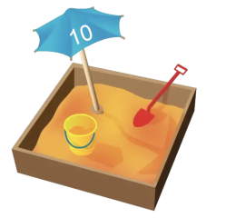 A sandbox containing a blue umbrella with '10' on it